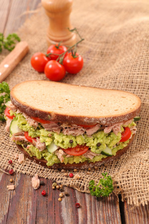 bread slice with tuna, avocado and tomato - Sandwichの写真素材
