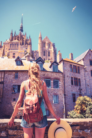 Woman tourist in the mont saint michelの写真素材