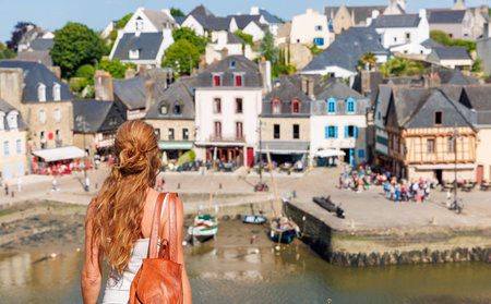 Woman tourist in Brittany, Saint Goustan Port, Auray village- Morbihan in Franceの写真素材
