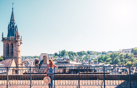Woman looking at panoramic view of Morlaix city skyline- Finistere, France