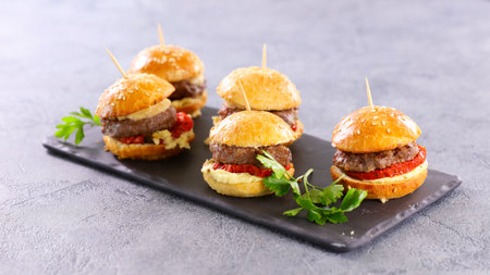 mini hamburgers at catering eventの写真素材