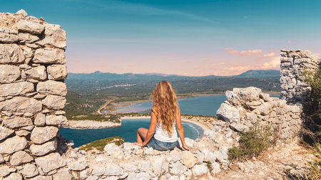Greece travel destination vacation- Breathtaking view of famous beach in Peloponnese, Pylos, Voidokoilia in Messinia- Panoramic view at sunset, Bay landscape in Greeceの写真素材