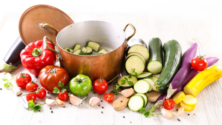 cooking pot with raw vegetable ingredient- cooking, recipe preparation, vegetarian dishの写真素材