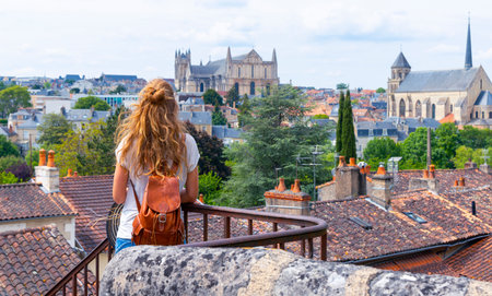 Woman tourist in Poitiers city landscape- France
