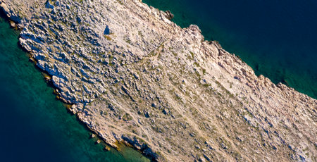 aerial view of rock on the sea- texture, wallpaper, backgrounds
