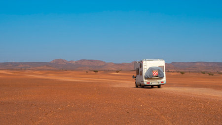 Motorhome in the desert, wanderlust travel, road trip, adventureの写真素材