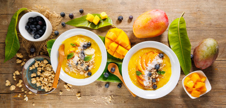 Top View of Smoothie Bowl with Mango, Blueberry, and Coconut â Healthy Breakfastの写真素材