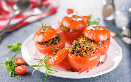 baked stuffed tomato with beefの写真素材