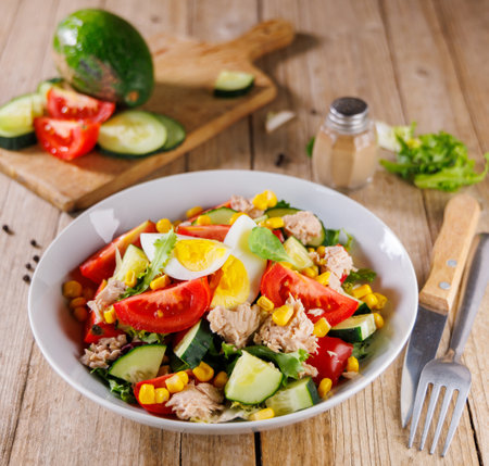 mixed vegetable salad with tomato, egg and cucumber. healthy food saladの写真素材