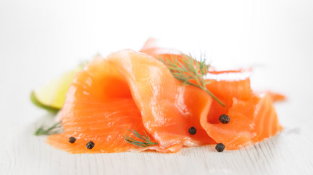 smoked salmon slice with lemon and dillの写真素材