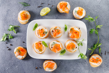 bread toast with cream and salmon. Buffet food, festive food, health foodの写真素材