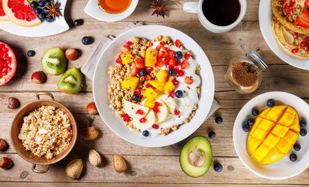 bowl of cereal with fruit and yogurtの写真素材