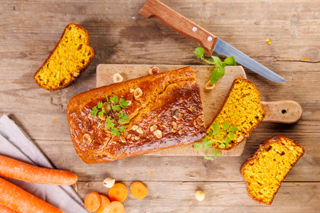 homemade vegan cake slice on wooden backgroundの写真素材