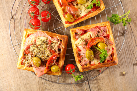 Waffle Toast Pizza with Tomato Sauce, Ham, and Mozzarella Cheeseの写真素材
