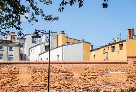 Wall backgrounds from Kerpichs of different colors and different houses.の写真素材