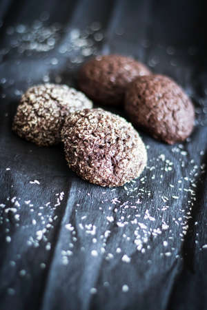 Chocolate chip cookies with coconut. Lie on a black and gray background.の写真素材
