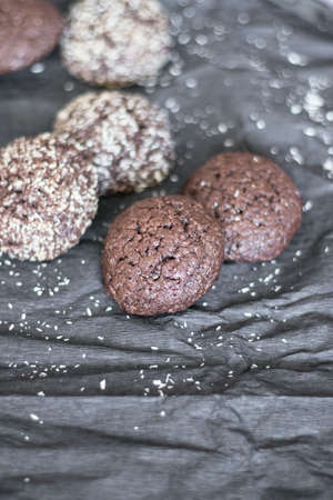 Chocolate chip cookies with coconut. Lie on a black and gray background.の写真素材