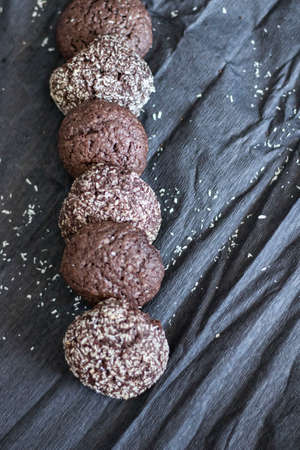 Chocolate chip cookies with coconut. Lie on a black and gray background.の写真素材