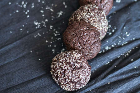 Chocolate chip cookies with coconut. Lie on a black and gray background.の写真素材