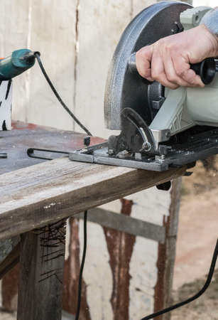 Wood processing with different tools. Working process.の写真素材