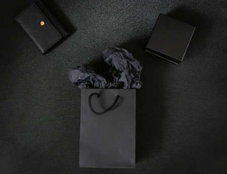 Empty black gift boxes. Black Friday. On a black backgroundの写真素材