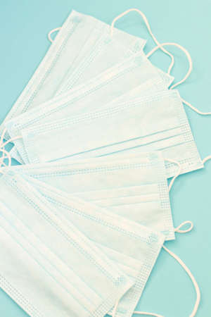 Hospital masks on a blue background. Medicines and fruits lieの写真素材