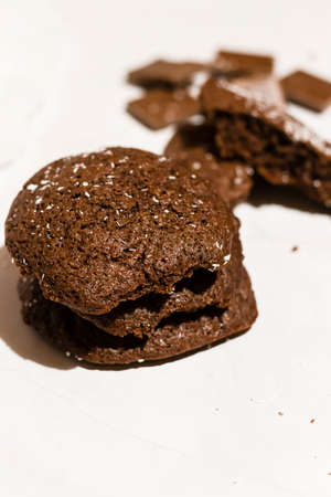 Chocolate chip cookies with coconut. Lying on a white background