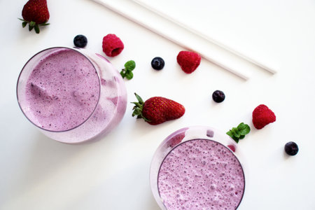 Smoothies with berries on a white background. selective focus.の写真素材