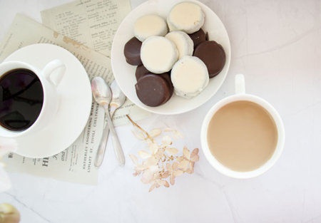 Cup of coffee and macaroons on the table, stock photoの写真素材