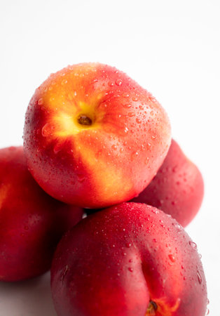 Fresh nectarines on white background, close-up, selective focusの写真素材