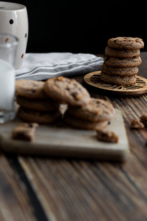 Chocolate chip cookies on a wooden table. Selective focus.