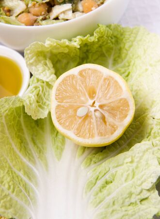 Lemon on a leaf of cabbage. Cooking. Healthy eatingの写真素材