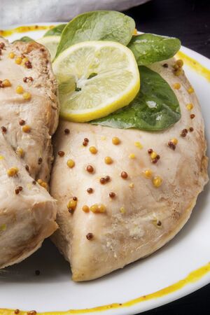 chicken fillet on a plate close-up. vertical photoの写真素材