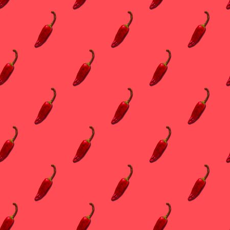 pepper hot food pattern on red backgroundの写真素材