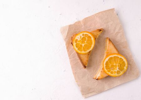 sandwiches with orange jam on a white background there is a place for text. Natural breakfast
