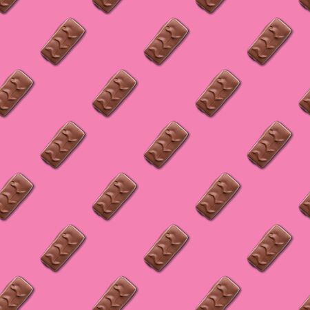 chocolate bar on a pink background. seamless pattern. Background imageの写真素材