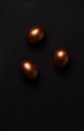 Easter eggs on a black background. Minimalism conceptの写真素材