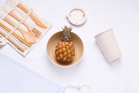 eco food items made of wood and metal straw on a white backgroundの写真素材