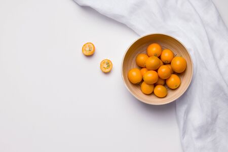 kumquat citrus in Minsk from bamboo on a white background. copy spaceの写真素材