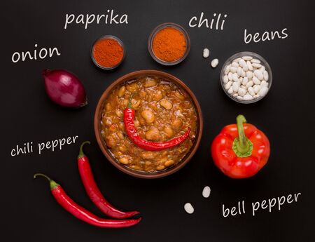 Tavche gravce recipe - a dish of Macedonian cuisine. ingredients on a black backgroundの写真素材