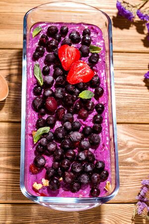 homemade sorbet from currant and ube berries on a wooden table. rustic styleの写真素材