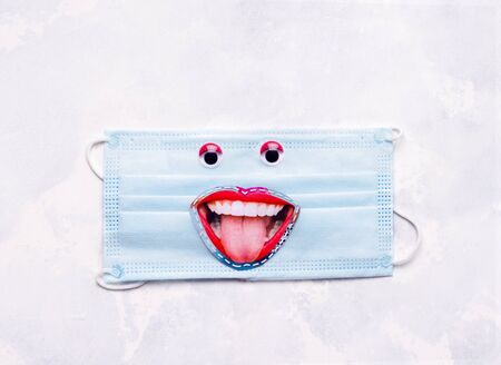 collage with mask on a white background. fun pandemic protection conceptの写真素材