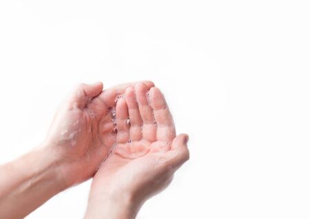 soapy hands on a white background copy space. coronovirus protection conceptの写真素材