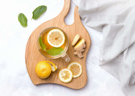 Food useful for immunity. Lemon in honey-sugar syrup on a white background. Copy spaceの写真素材