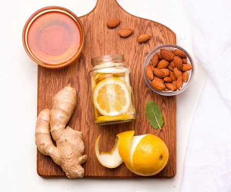 Food useful for immunity. Lemon in honey-sugar syrup on a white background. Copy spaceの写真素材