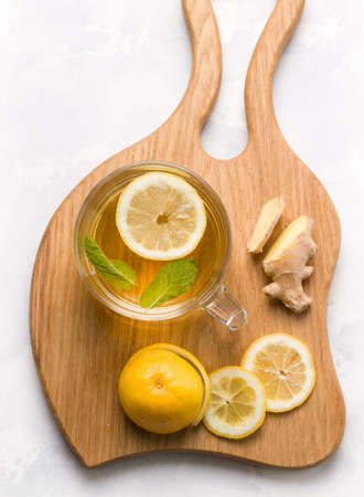 Food useful for immunity. Lemon in honey-sugar syrup on a white background. Copy spaceの写真素材