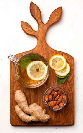 Food useful for immunity. Lemon in honey-sugar syrup on a white background. Copy spaceの写真素材