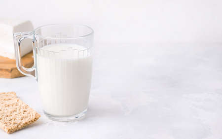 Fermented milk drink kefir in a cup on a white background. Copy spaceの写真素材