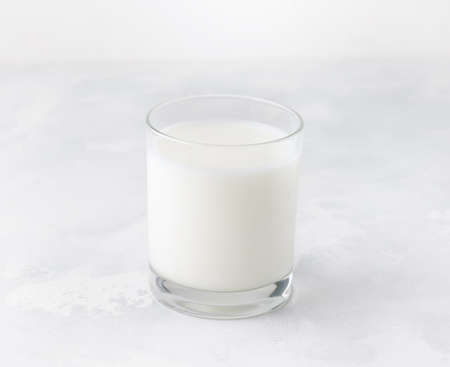 Kefir milk in a glass on a white backgroundの写真素材
