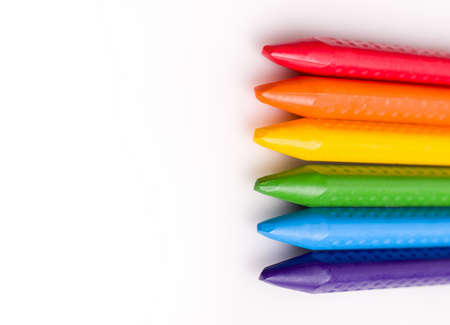 The concept of children's creativity drawing. Crayons on a white background copy space.の写真素材